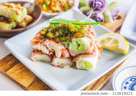Pork wrapped in leek sauce Pork wrapped in leek sauce 113619321