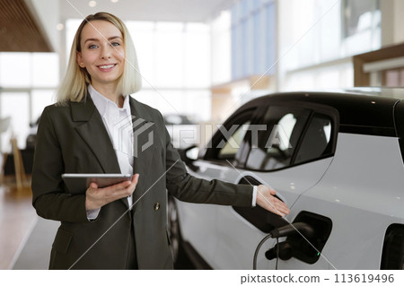 Concept of buying eco-friendly car for progressive customer. Concept of buying eco-friendly car for progressive customer. 113619496