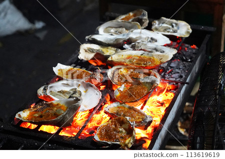 Grilled oyster at Jakarta Food Streets Vendor Grilled oyster at Jakarta Food Streets Vendor 113619619
