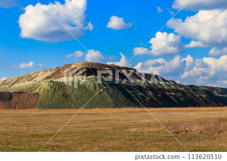 View of slag heaps of iron ore quarry. Mining industry View of slag heaps of iron ore quarry. Mining industry 113620510
