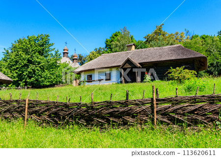 Ancient traditional ukrainian rural house in Pyrohiv (Pirogovo) village near Kiev, Ukraine Ancient traditional ukrainian rural house in Pyrohiv (Pirogovo) village near Kiev, Ukraine 113620611
