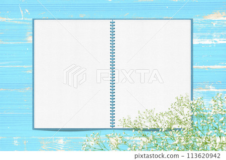 Shabby blue wood with a sketchbook and baby's breath Shabby blue wood with a sketchbook and baby's breath 113620942