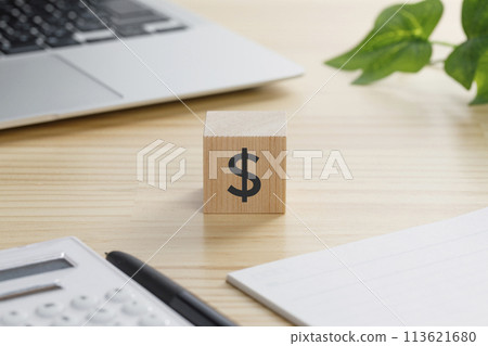 A building block with the letter $ written on it A building block with the letter $ written on it 113621680