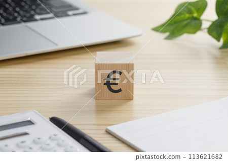 A building block with the word € written on it A building block with the word € written on it 113621682