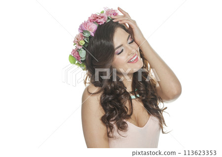 Attractive young model with long curly hair, makeup and perfect healthy skin Attractive young model with long curly hair, makeup and perfect healthy skin 113623353