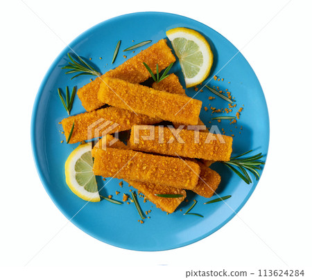 Crispy golden fried fish fingers sticks on a blue plate isolated on white background. Top iew. 113624284