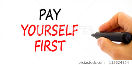 Pay yourself first symbol. Concept words Pay yourself first on beautiful white paper. Beautiful white table white background. Businessman hand. Business pay yourself first concept. Copy space. 113624534