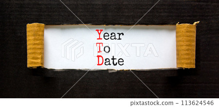 YTD year to date symbol. Concept words YTD year to date on beautiful white paper. Beautiful black paper background. Business YTD year to date concept. Copy space. 113624546