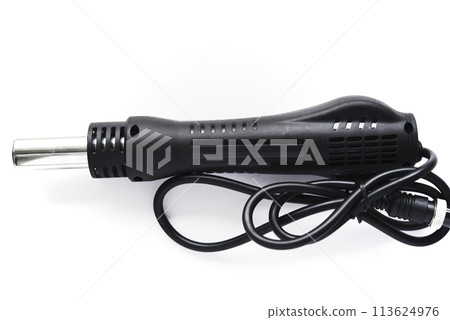 The heat gun of the soldering station. Soldering iron for electronic circuit boards on a white background. The heat gun of the soldering station. Soldering iron for electronic circuit boards on a white background. 113624976