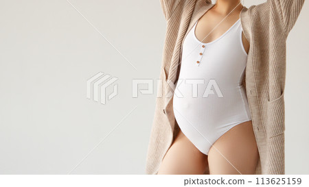 A beautiful pregnant girl in a white bodysuit and A beautiful pregnant girl in a white bodysuit and 113625159