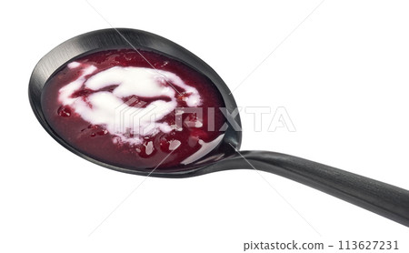 Borscht with sour cream in black spoon, beetroot soup isolated on white background 113627231