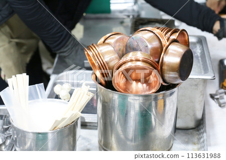 Tools displayed at a dalgona (caramelized candy) night market (Korea) 113631988