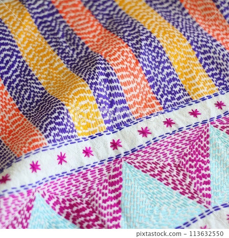 Close up of colorful hand made quilt for background use, Thailand. Close up of colorful hand made quilt for background use, Thailand. 113632550