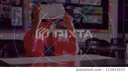 Image of scope scanning over schoolgirl wearing vr headset and moving her hands 113633033
