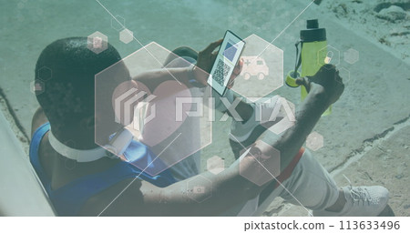 Image of man holding smartphone with covid 19 vaccination passport over coronavirus icons 113633496