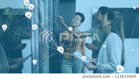 Image of data processing over diverse business people taking notes in office 113633689