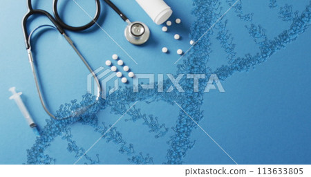 Image of dna strand over pills and stethoscope 113633805