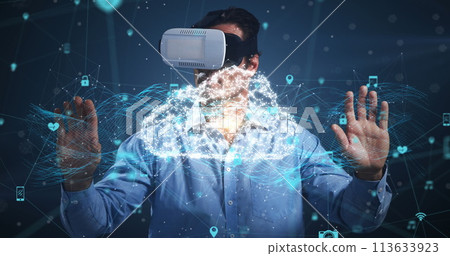 Image of digital interface with icons and network of connections with man wearing VR headset Image of digital interface with icons and network of connections with man wearing VR headset 113633923
