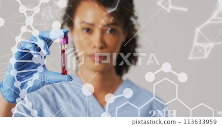 Image of dna strand and shapes over biracial female doctor with test tube Image of dna strand and shapes over biracial female doctor with test tube 113633959