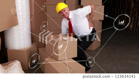 Image of network of conncetions with icons over caucasian male worker in warehouse Image of network of conncetions with icons over caucasian male worker in warehouse 113634141
