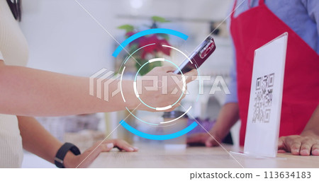 Image of scope scanning over diverse shop assistant and customer paying with smartphone 113634183