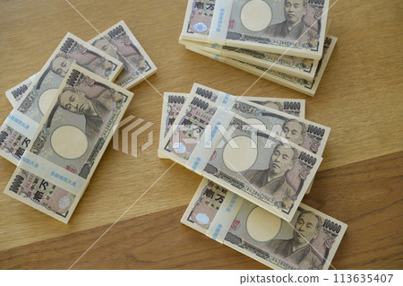 A stack of bills on a desk A stack of bills on a desk 113635407
