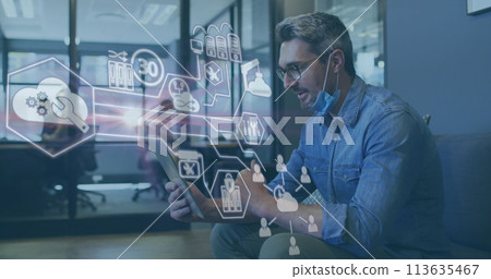 Image of financial data processing over businessman with face mask using tablet in office Image of financial data processing over businessman with face mask using tablet in office 113635467