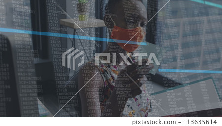 Image of financial data processing over businesswoman with face mask working in office Image of financial data processing over businesswoman with face mask working in office 113635614