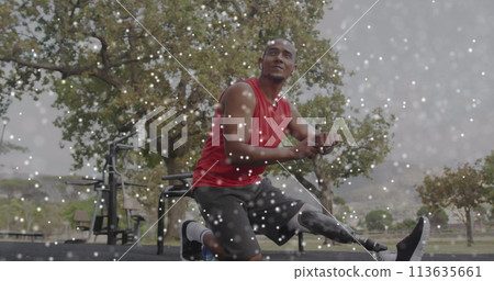 Image of particles forming dna strand over male athlete with prosthetic leg exercising outdoors 113635661