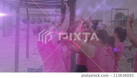 Image of light spots over diverse women at obstacle course high fiving Image of light spots over diverse women at obstacle course high fiving 113636093