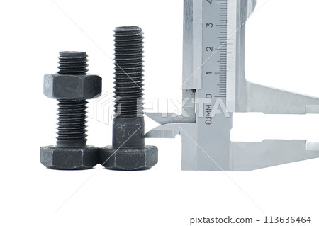 Hex head bolt and nut measured by caliper over white 113636464