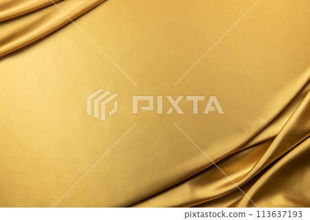 Draped golden cloth background texture 113637193