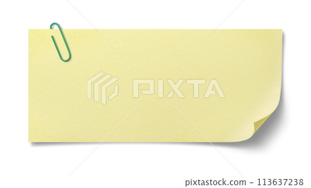 Texture of yellow note paper with paperclip 113637238