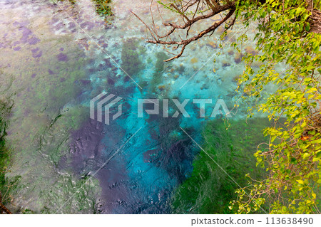 Clear turquoise water of natural karst spring of Blue Eye, Albania 113638490