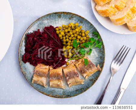 Cold smoked mackerel with beetroot and green peas Cold smoked mackerel with beetroot and green peas 113638551