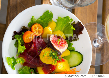 Salad with fresh tuna, mango, zucchini 113638680