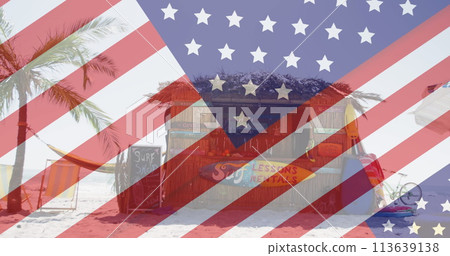 Image of american flag revealing statue of liberty and beach bar 113639138
