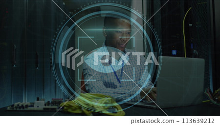 Image of eye icon over african american male server room worker 113639212
