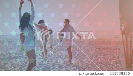 Multiple blinking stars against group of friends walking at the beach 113639300