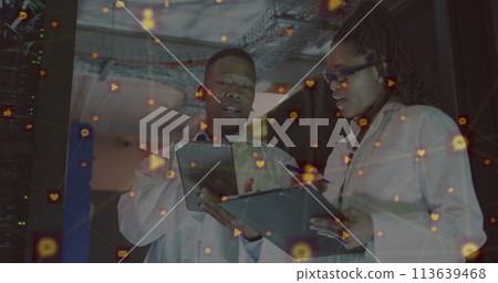 Image of network of connections over african american couple server room workers 113639468