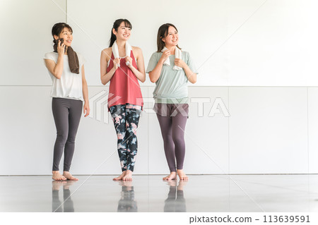 Female friends, mom friends, and instructors attending yoga classes (diet, work exercise, training, fitness) Female friends, mom friends, and instructors attending yoga classes (diet, work exercise, training, fitness) 113639591