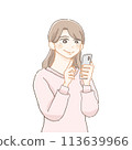 Side profile of a smiling woman operating a smartphone 113639966