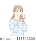 Side profile of a smiling woman operating a smartphone 113641339