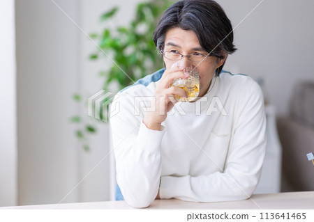 Man drinking whiskey Man drinking whiskey 113641465