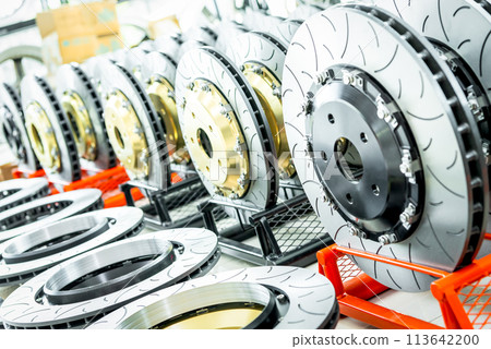 Checking car brake system for repair at car garage 113642200