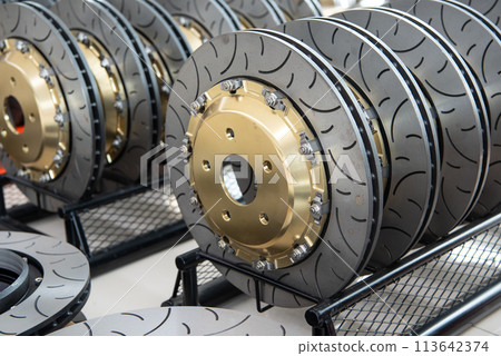 Checking car brake system for repair at car garage 113642374