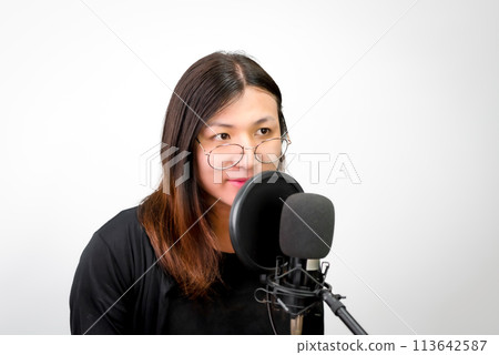 Woman (LGBTQ) singer sing a song with microphone 113642587