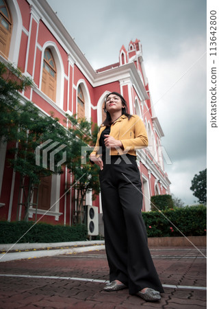 Woman (LGBTQ) posing outdoor fashion style 113642800