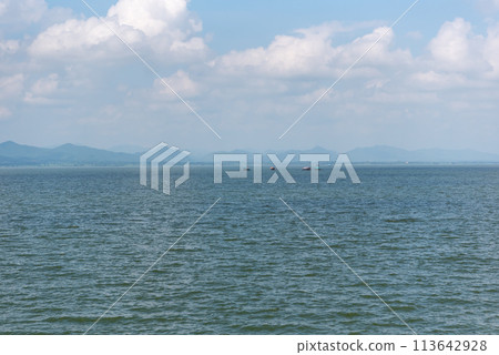 Beach and sea with blue sky Beach and sea with blue sky 113642928