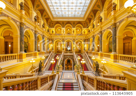A massive building with numerous staircases leading to different levels within the National Museum Foyer in Prague, Czechia 113643905